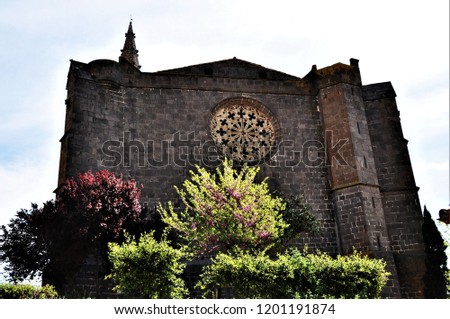 the saint jean-baptiste church from vias ,france  Royalty-Free Stock Photo #1201191874