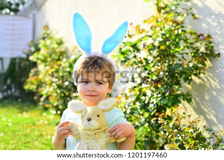 Happy easter. Cute bunny. Child boy wearing bunny ears. Kid preparing for Easter. Happy family and toys