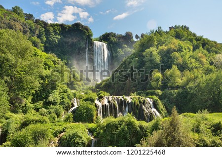The Cascata delle Marmore (Marmore Falls) is a man-made waterfall created by the ancient Romans located near Terni in Umbria region, Italy. The waters are used to fuel an hydroelectric power plant Royalty-Free Stock Photo #1201225468