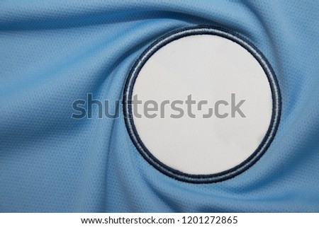 Blank team logo patch on sport jersey for graphic design logo mock up