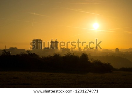 Morning evening foggy city highrise skyscrapers skyline at sunrise at sunset wallpaper