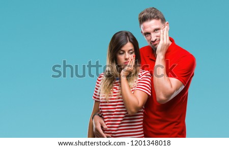 Young couple in love over isolated background thinking looking tired and bored with depression problems with crossed arms.