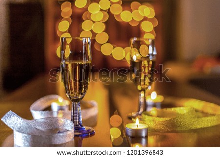 Two Glasses of Champagne With a Blurred Background
