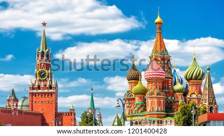Moscow Kremlin and St Basil's Cathedral on old Red Square in summer, Russia. This place is famous landmark of Moscow city. Beautiful skyline, panorama of  Moscow historical center. Travel theme.