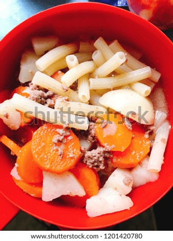 Pasta soup with beef pork mince potato carrot chicken stock traditional food Asian cuisine 