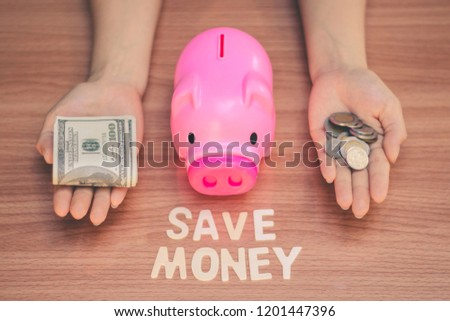 Save money in pig pink for future use, Concept saving money for the future.