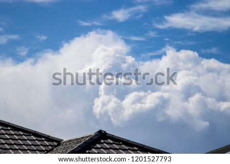 Roof top cumulus clouds