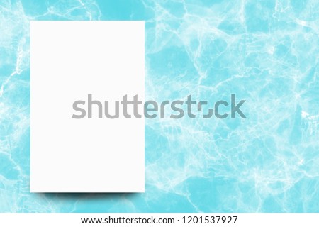 Empty white paper sheet on Turquoise marble background,Mock up for design.