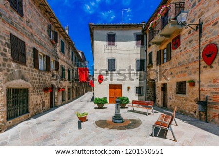 Medieval Italian streets and houses in the Tuscan town of Abbadia San Salvatore Royalty-Free Stock Photo #1201550551