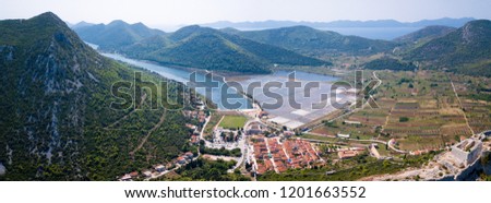 Ston is located at the beginning of the Peljesac Peninsula. 
Surrounded by three seashores, it is protected by water, salt water, salt water, fertile plains. It is also known as the “salt town”. 