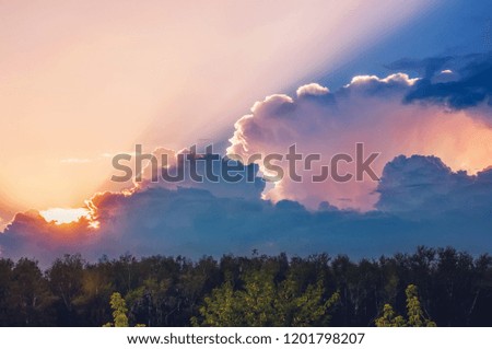 The twilight beauty of the evening colorful clouds is the sunlight with dramatic sky