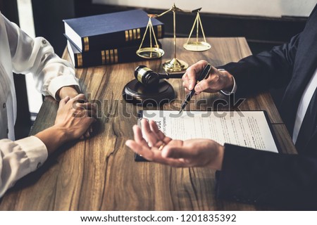 Good service cooperation, Consultation of Businesswoman and Male lawyer or judge counselor having team meeting with client, Law and Legal services concept.