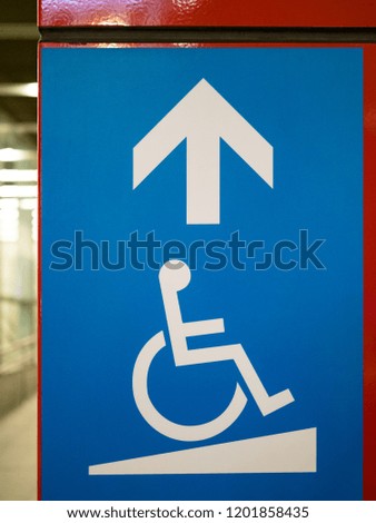 sign with wheelchair elevator isolated on white background