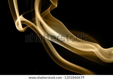 PHOTO of abstract smoke trails, designs, shapes on background. wallpaper wall art