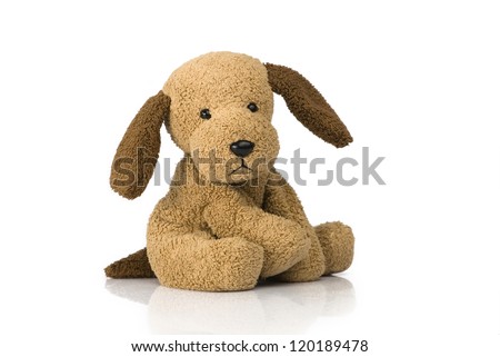 Cute puppy toy shot on white Royalty-Free Stock Photo #120189478