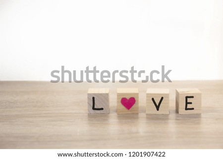 wood cube with message LOVE