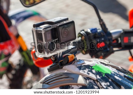 Action camera on a motorcycle rider's helmet