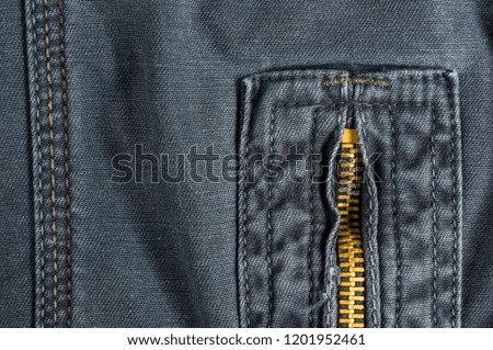 clothing items washed cotton fabric texture with seams, clasps, buttons and rivets