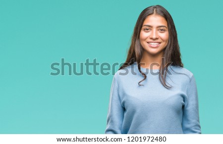 Beautiful young arab woman over isolated background Royalty-Free Stock Photo #1201972480