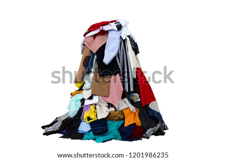 Big pile of different colored cloth isolated.  Royalty-Free Stock Photo #1201986235
