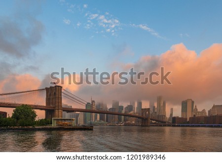 View to Manhattan Skyline from Brooklyn Bridge Park Dumbo at sunrise, New York, USA