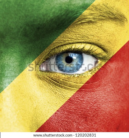 Human face painted with flag of Republic of the Congo