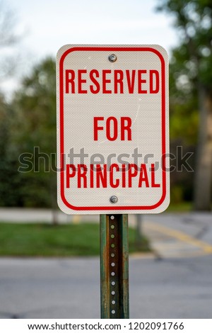 Reserved for Principal Parking Spot and Sign