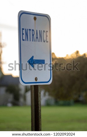 Entrance This Way Arrow Sign