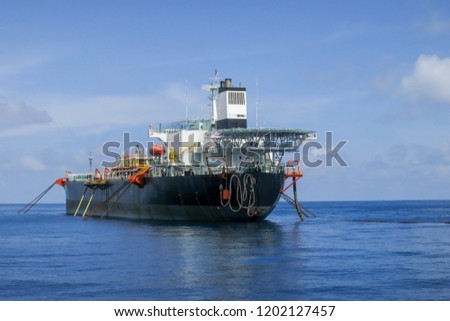 Floating Storage Offloading tanker ship or also known as FSO floating in the open sea. Royalty-Free Stock Photo #1202127457