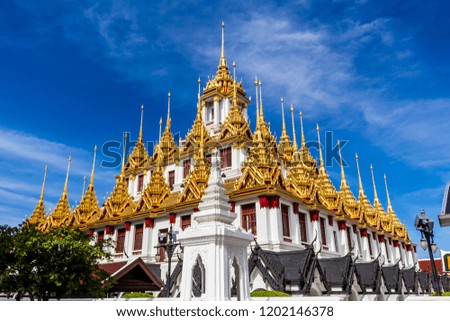 Temple roof in Bangkok Thailand. Blue sky blackgroud