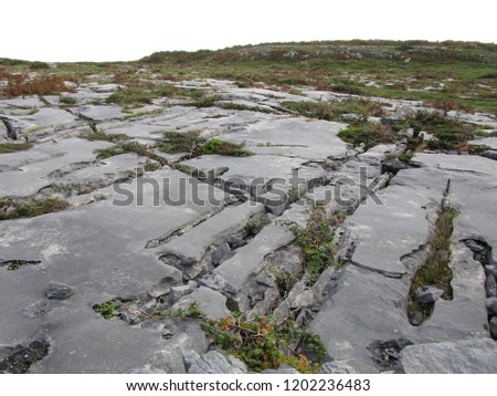   View of the limestone rocky terrain (burren) of the Aran Islands in Ireland                             
