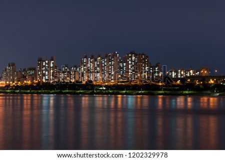 A night cityscape view in Korea Royalty-Free Stock Photo #1202329978