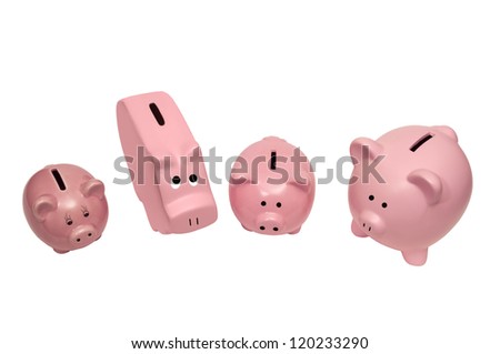 This picture shows different kinds of piggy banks.  Isolated on white.