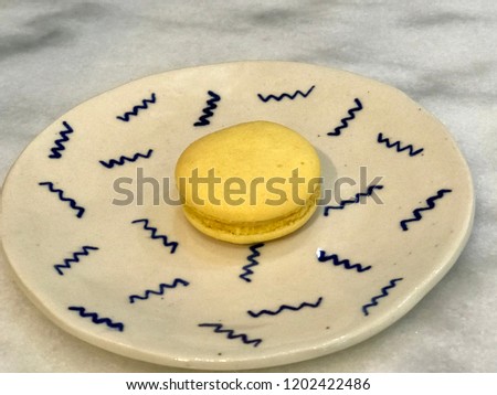 Pineapple on a plate with a pattern.