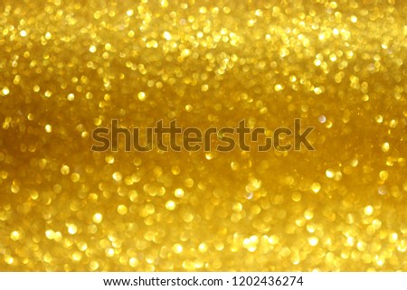 gold abstract bokeh glitter texture background, filled with shiny gold glitter background Royalty-Free Stock Photo #1202436274