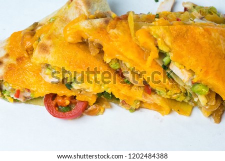 quesadilla with chicken and fresh vegetables