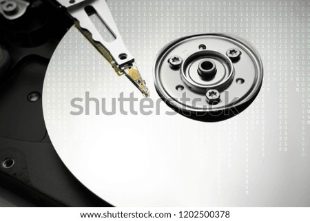 Green Binary numbers on hard disk drive of computer