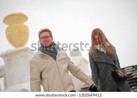 happy couple in love in winter park