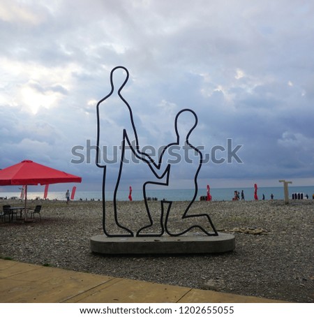 Batumi Beach Couple Male Holding Hand of Female with Sea View