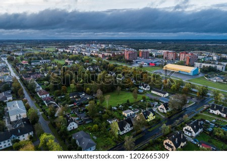 Aerial view of the city at sunset. Beautiful autumn city landscape. 
