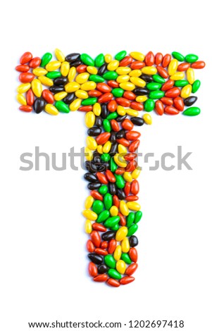 T Letter of alphabet made of candy isolated on white background