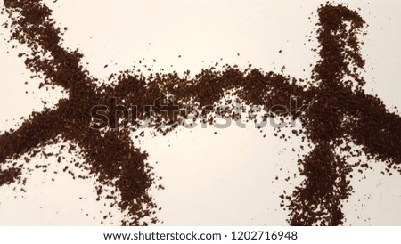 Ground Coffee Laid Out on White Background