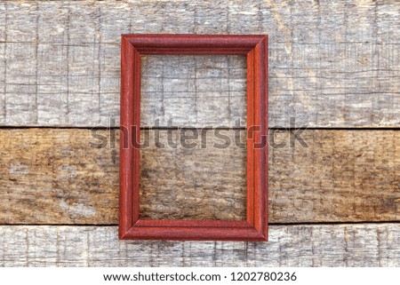 Simple eco rustic old vintage wooden frame on desk texture background. Close up of wall made of wooden planks. Top view, flat lay, copy space, mock up