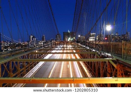 New York skyline, Brooklyn Bridge traffic at night, Manhattan buildings and skyscrapers