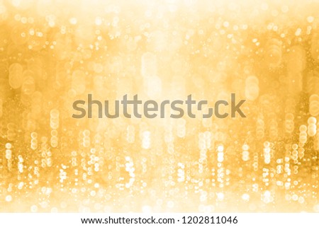 Fancy glitzy gold glitter sparkle confetti background for golden happy birthday party invite, 50 wedding anniversary, fun music dance club, winter Christmas or New Year’s Eve champagne bubbles texture Royalty-Free Stock Photo #1202811046