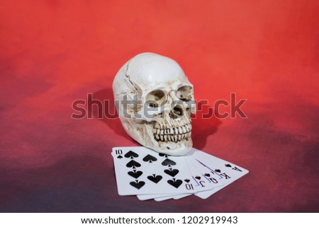 Casino abstract photo. Poker game on red background.  Theme of gambling.
