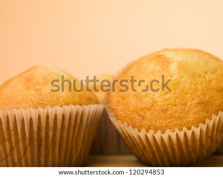 simple gold muffins beige background detail