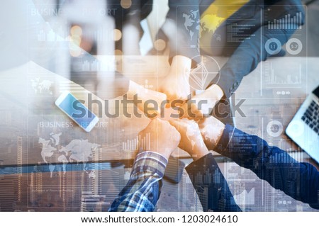 business Advisory Team Collaborates and Analyzes the company's Annual Financial Statements. Balance sheets Audit, TAX, Return on Investment  analysis shareholders,mission vision business team building Royalty-Free Stock Photo #1203024610