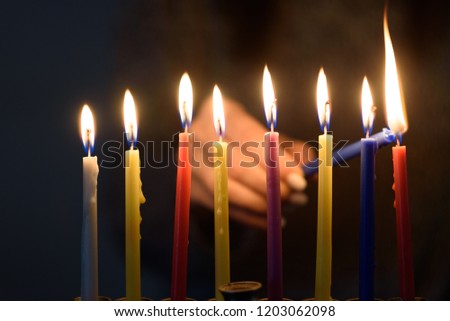 Hanukkah Jewish holiday celebrated eight days to mark the 8 days oil burned. People celebrate Chanukah by lighting candles on a menorah, also called a Hanukiyah. Each night, one more candle is lit.