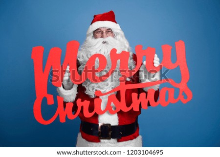 Santa Claus with christmassy banner 